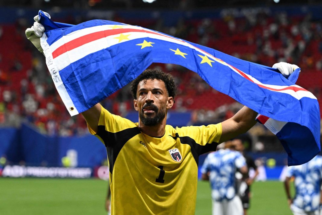 115283652-cape-verdes-goalkeeper-01-vozinha-celebrates-with-his-national-flag-at-the-end-of-th